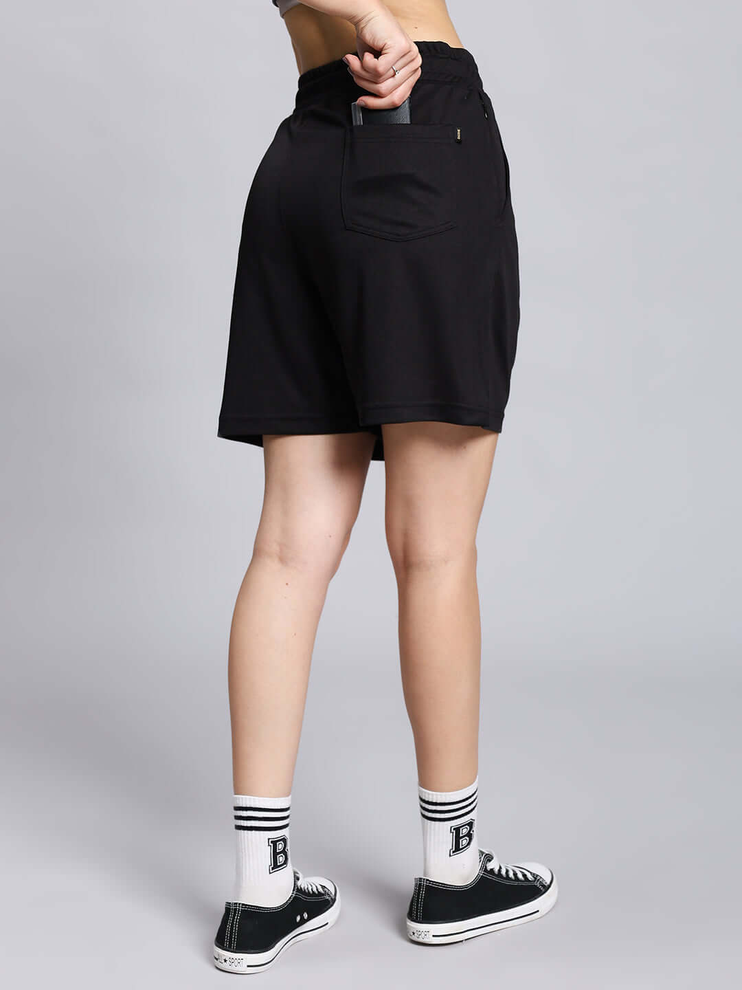 Back view of women's Wily tactical regular fit black shorts, showcasing comfortable, stylish design ideal for casual and active wear.