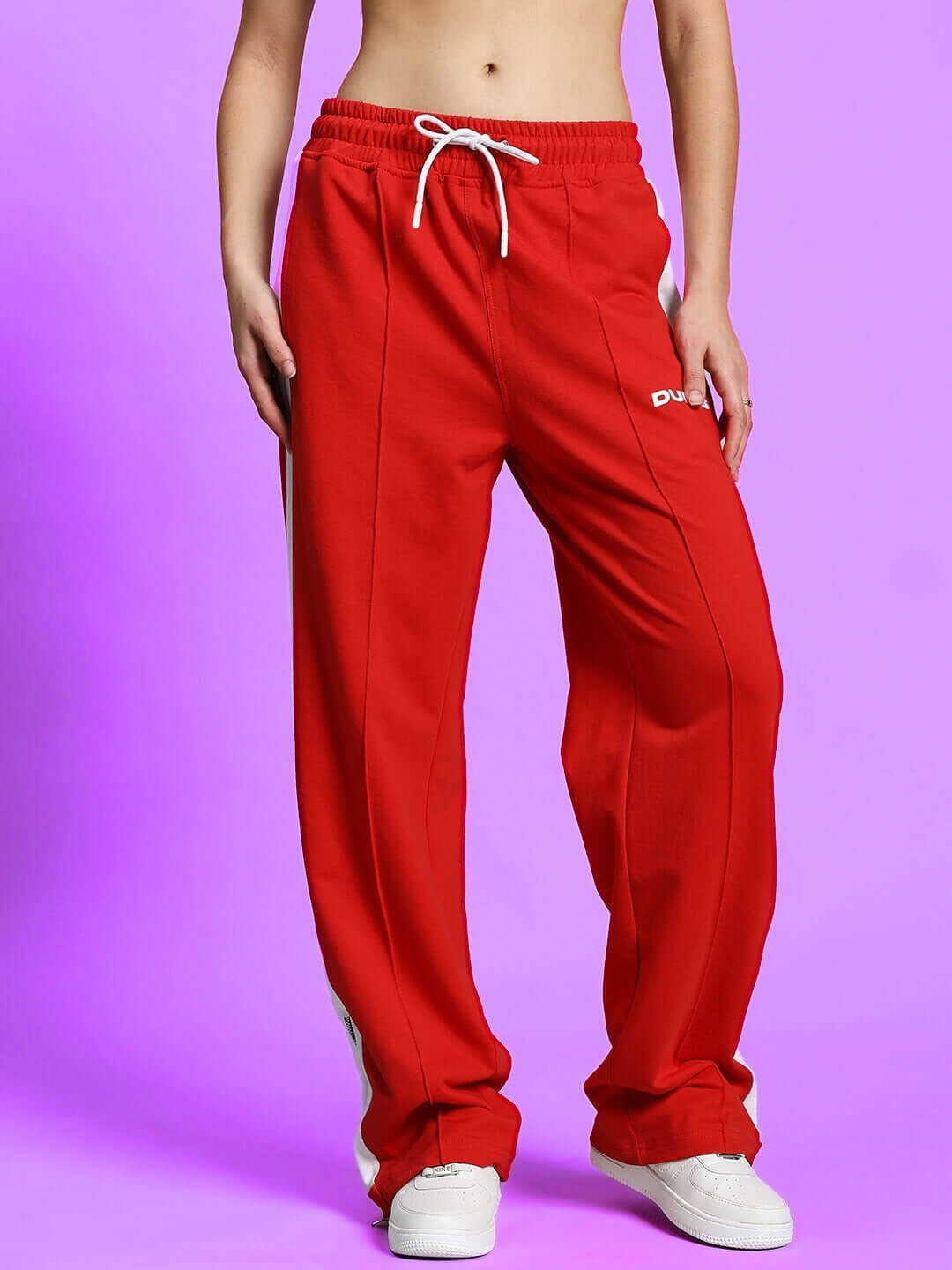 Women's red and white Wonder Slit Zipper Joggers by DUDS, featuring stylish cut and drawstring, custom fit option available.