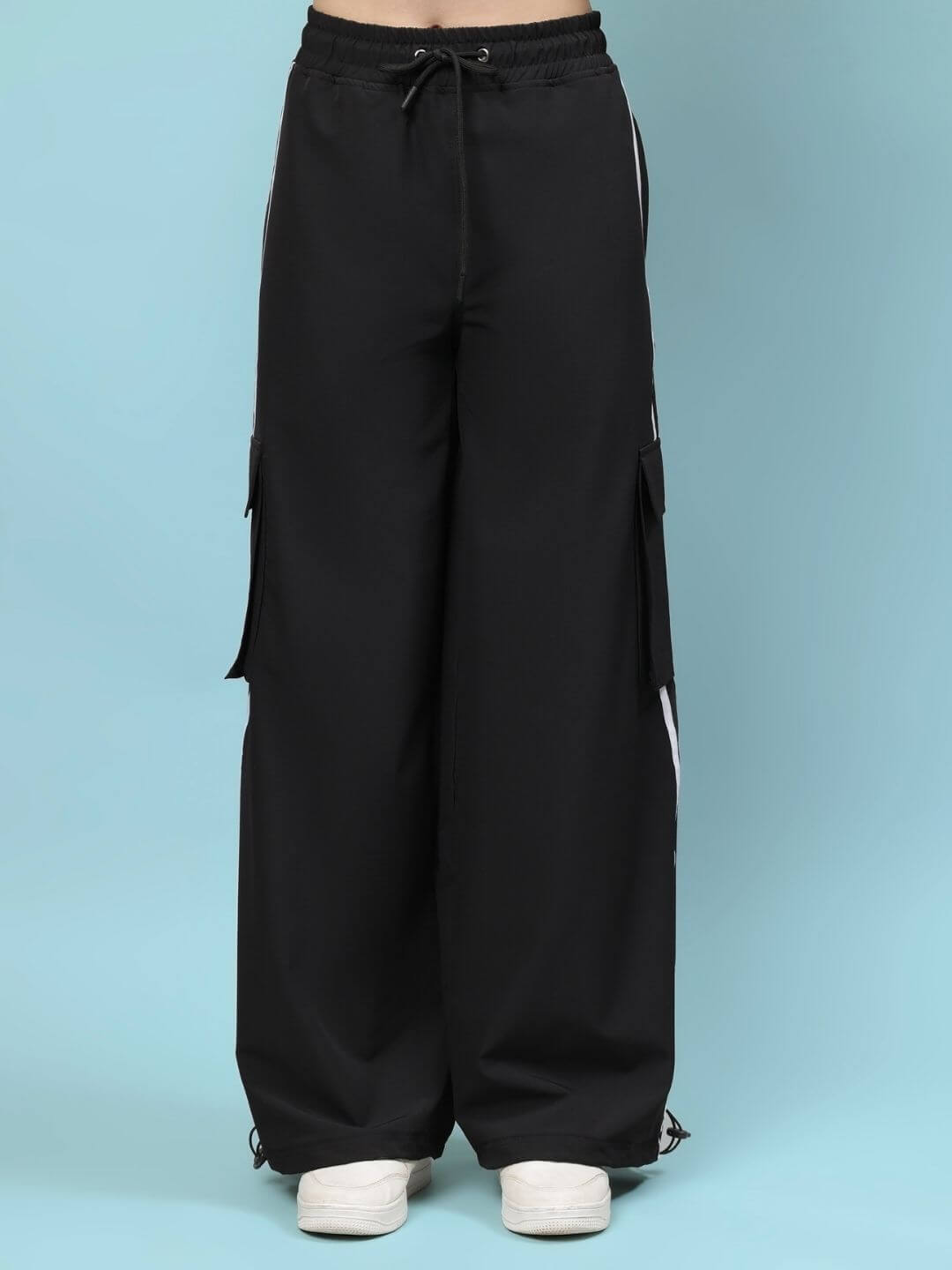 Women's Xavier Relaxed Fit Multi-Pocket Cargo Black pants, showcasing comfortable, stylish design on a model.