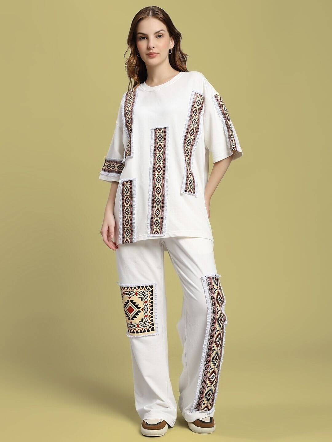 Model wearing the WOMEN'S YARA GEOMETRIC PRINT CO-ORD SET OFF-WHITE, featuring a chic geometric pattern and relaxed fit.
