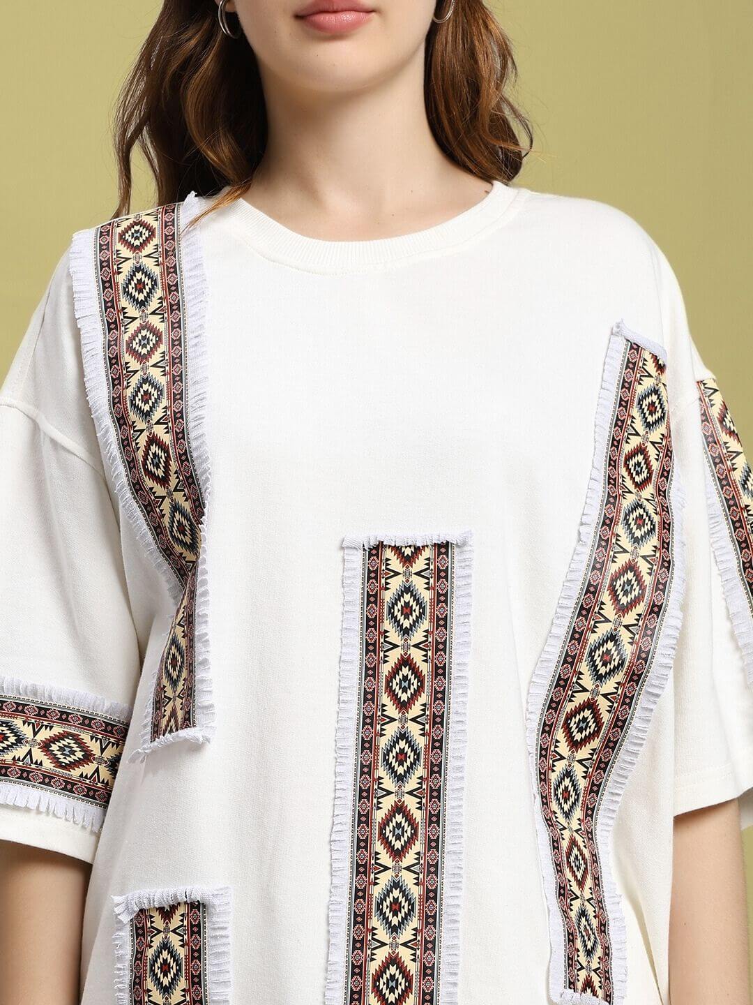 Close-up of the WOMEN'S YARA GEOMETRIC PRINT CO-ORD SET OFF-WHITE featuring detailed geometric patterns.