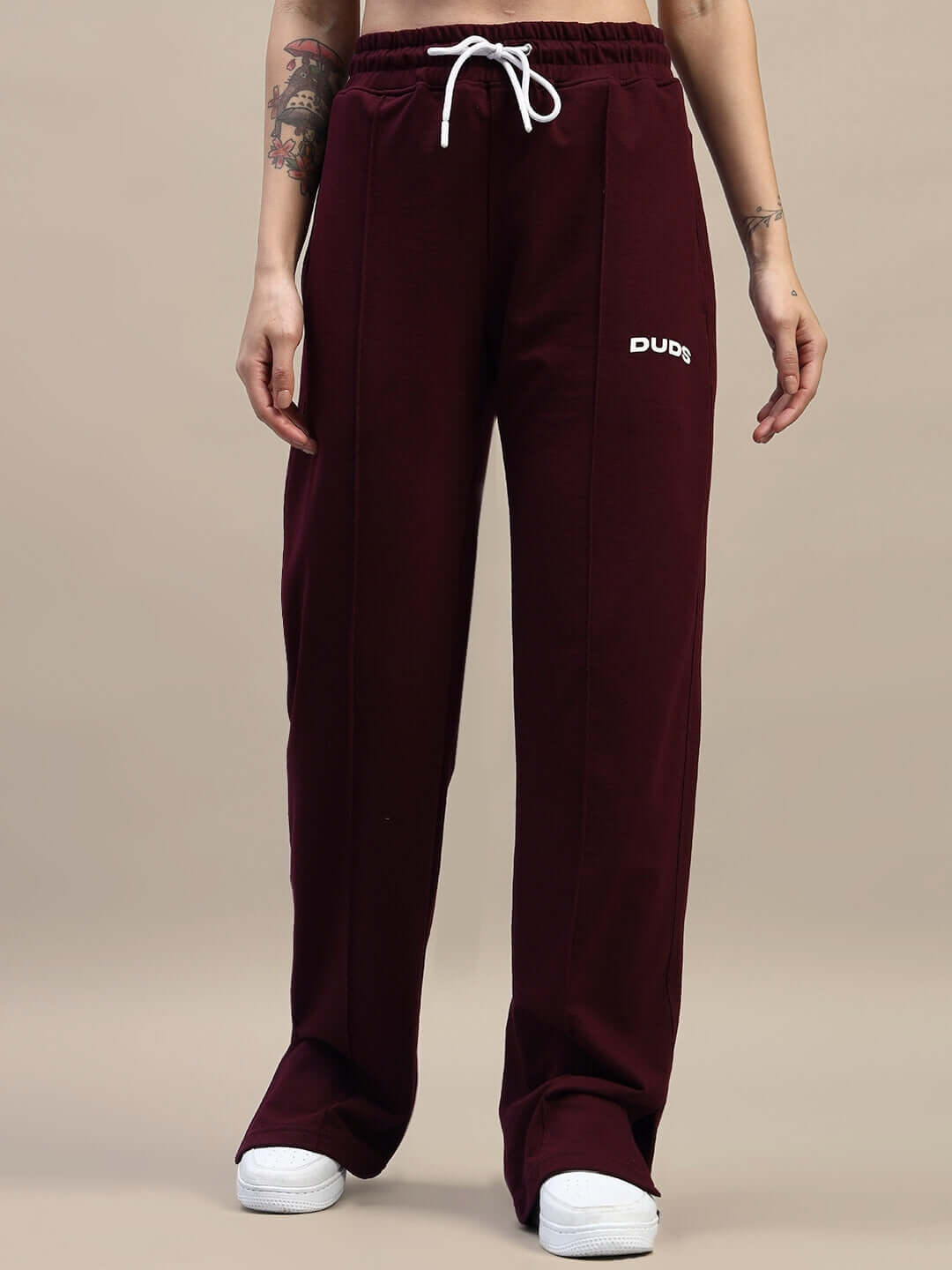 WOMEN'S ZION RELAXED FIT CO-ORD SET MAROON, featuring maroon relaxed fit pants with white drawstring, showcasing casual style.