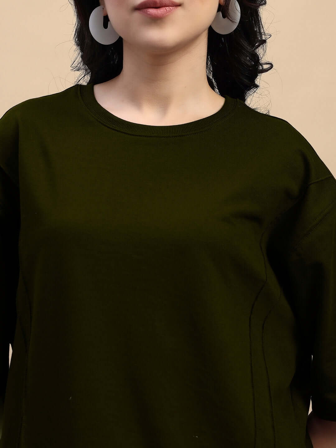 Woman wearing olive green Women's Zion Relaxed Fit Co-ord Set with premium cotton fabric, featuring a comfortable crew neck design.