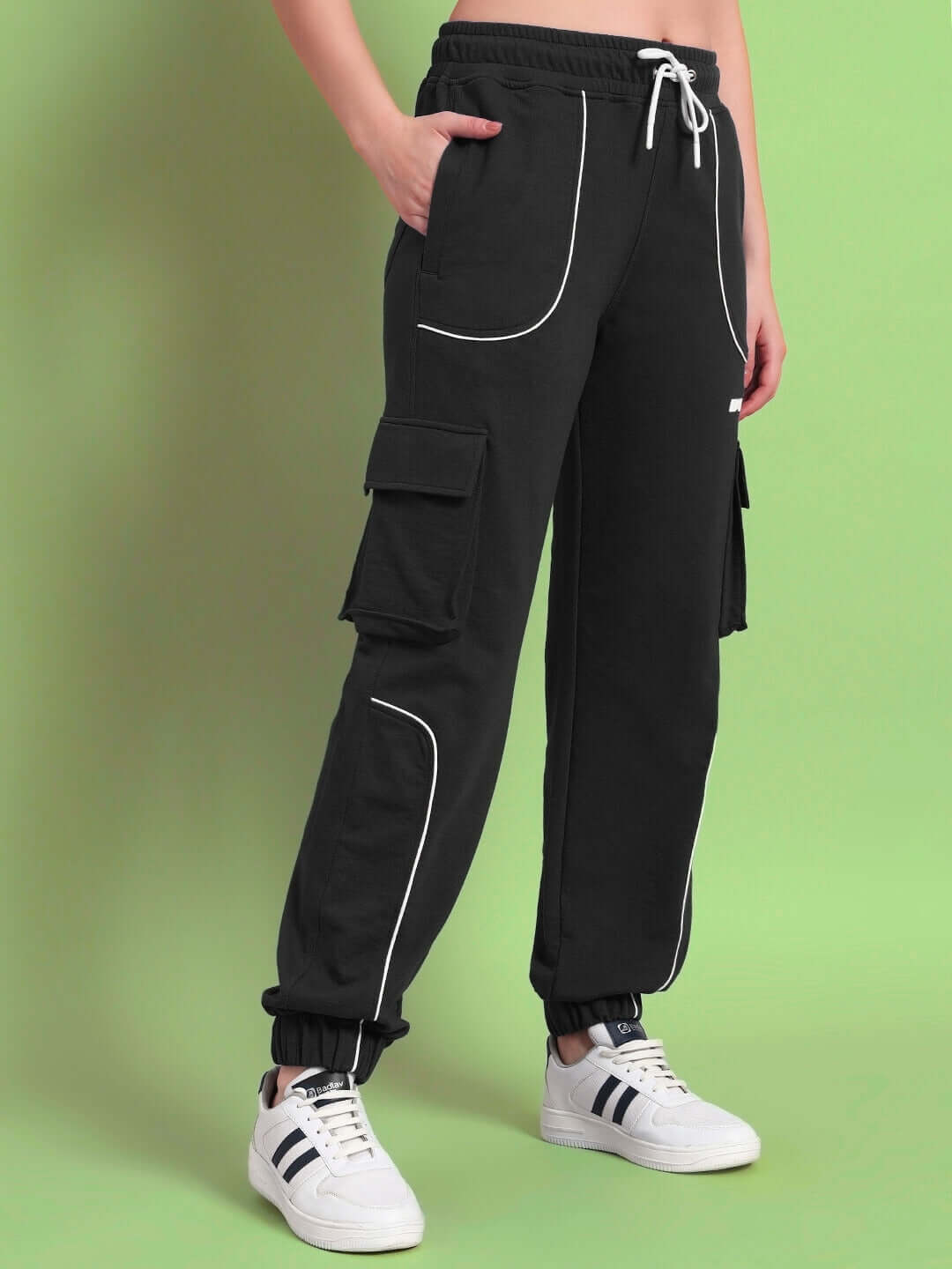 WOMENS DEVENO RELAXED-FIT JOGGERS BLACK displayed on model with pocket design.