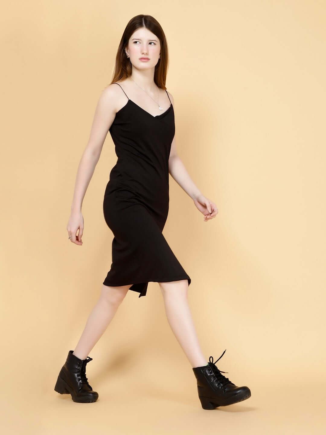 Model wearing WOMEN GLAMOUR LYCRA DRESS BLACK, showcasing elegant design and fit.