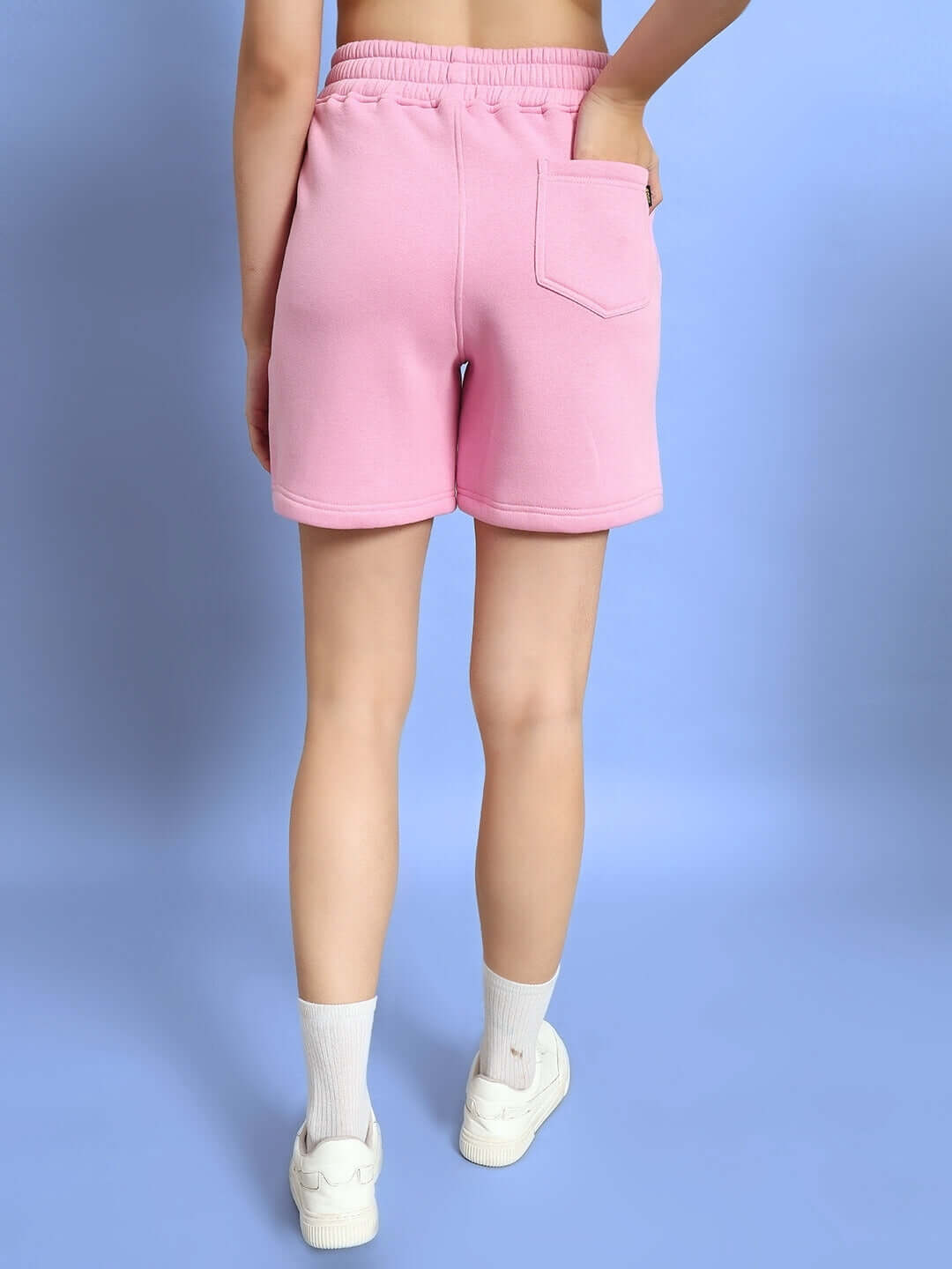 Back view of WOMEN LOVERS CLUB FLEECE SHORTS PINK showcasing relaxed fit and pocket.