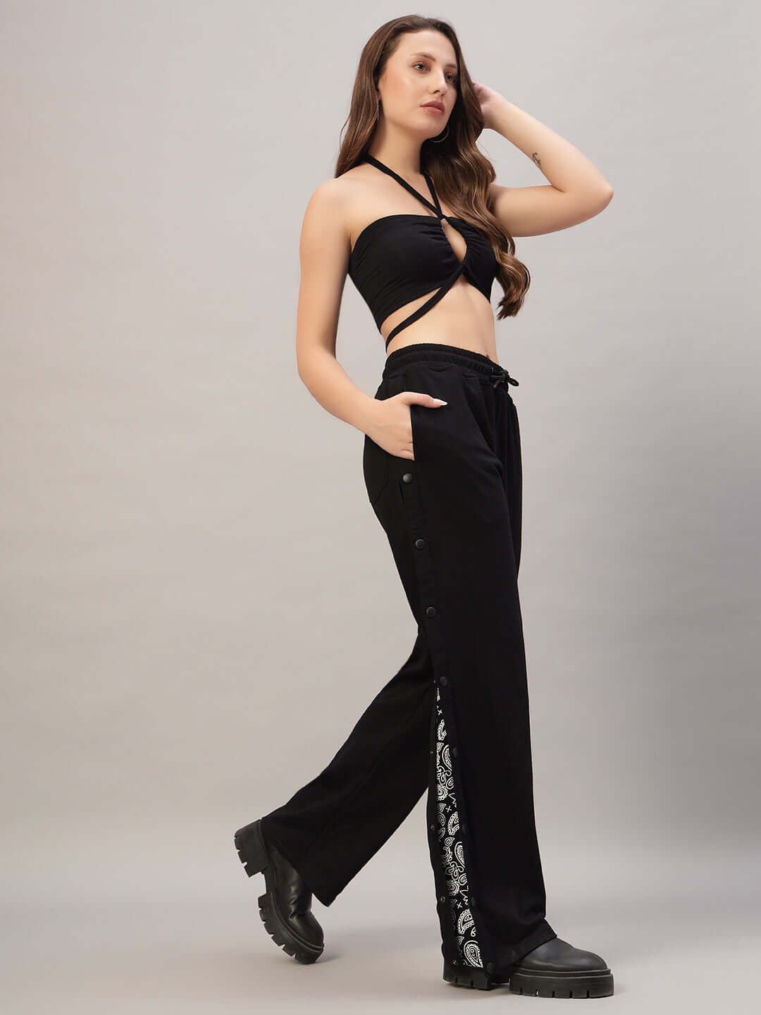 Model wearing Women's Mambo Joggers in black, showcasing the custom-fit option by DUDS, tailored by experienced professionals.