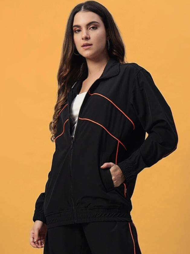 Women's Raider Co-Ord Set in black polyester fabric with red accents, perfect for stylish comfort, made in India. Cold machine wash recommended.