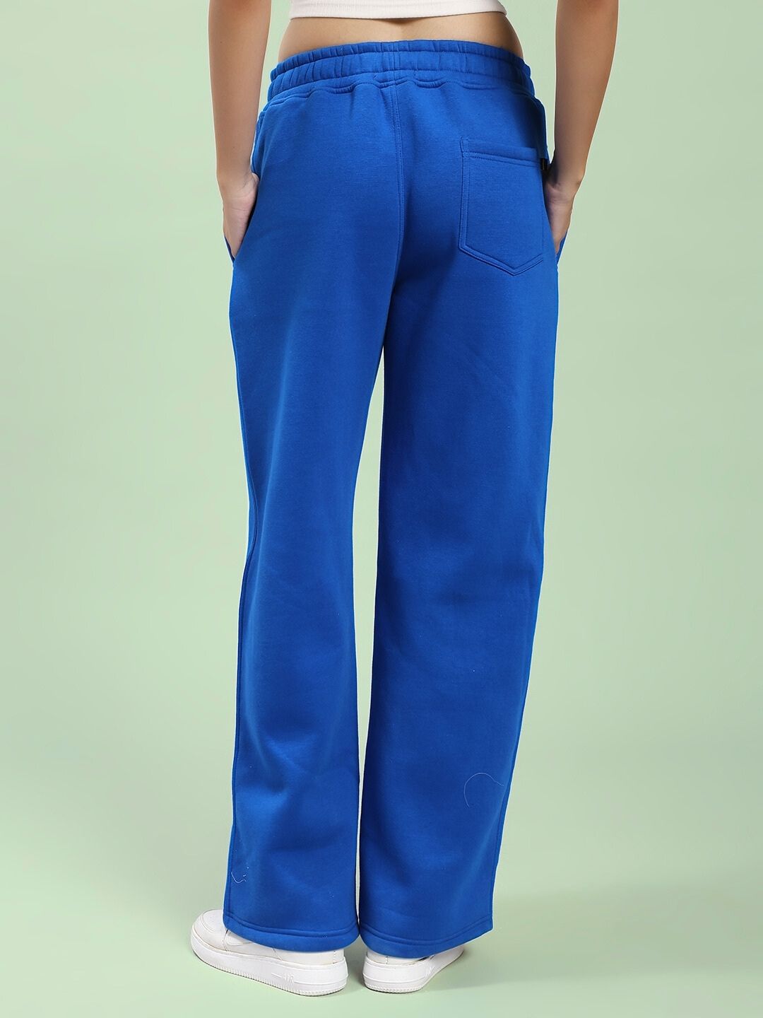 Back view of WOMEN'S RAPID STRIDE FLEECE JOGGER ROYAL BLUE highlighting comfort and style.