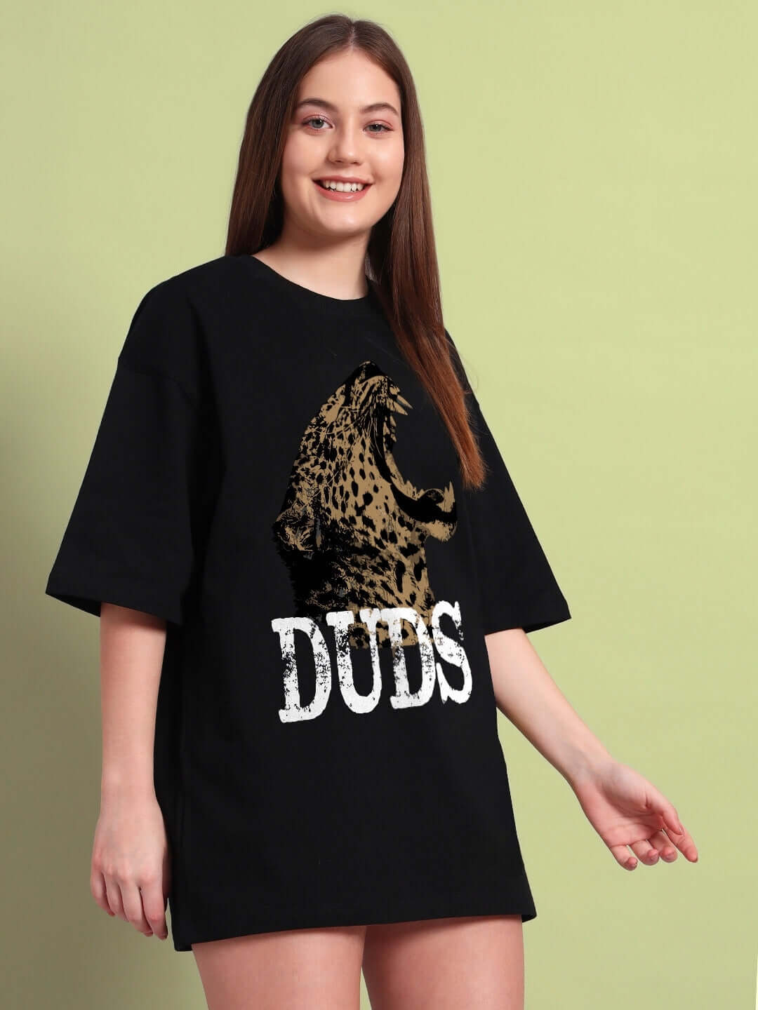 Woman wearing WOMENS ROARING THUNDER PRINTED OVERSIZED T-SHIRT BLACK with leopard design, showing front details.