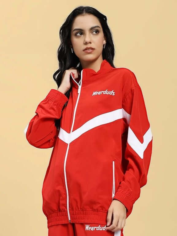 Woman wearing WOMEN ROYAL COMFORT RELAXED FIT JACKET RED, showcasing its bold style and comfortable fit.