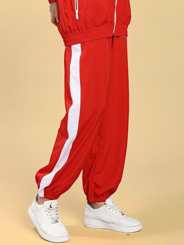 WOMEN'S ROYAL COMFORT RELAXED FIT JOGGER RED with white stripe, stylish and comfortable joggers for women, side view.