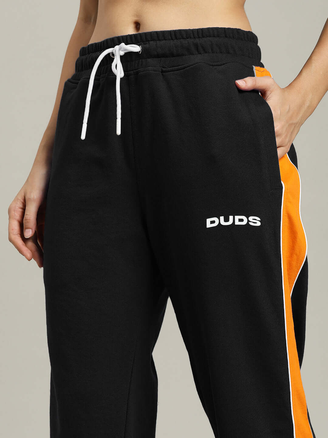 WOMENS SANFORD STRIPE JOGGERS BLACK with side stripes, showcasing relaxed fit and sporty style.