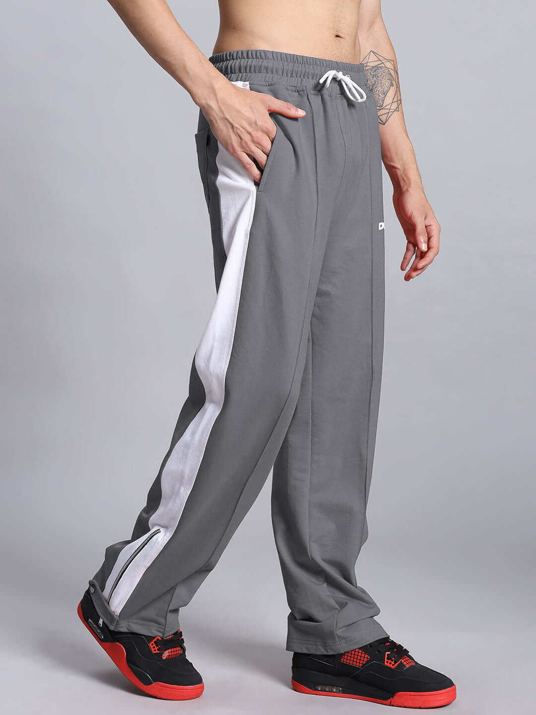 Grey white Wonder Slit Zipper Joggers with customizable size, made by DUDS. Features side zippers and sporty style. Prepaid custom fit available.