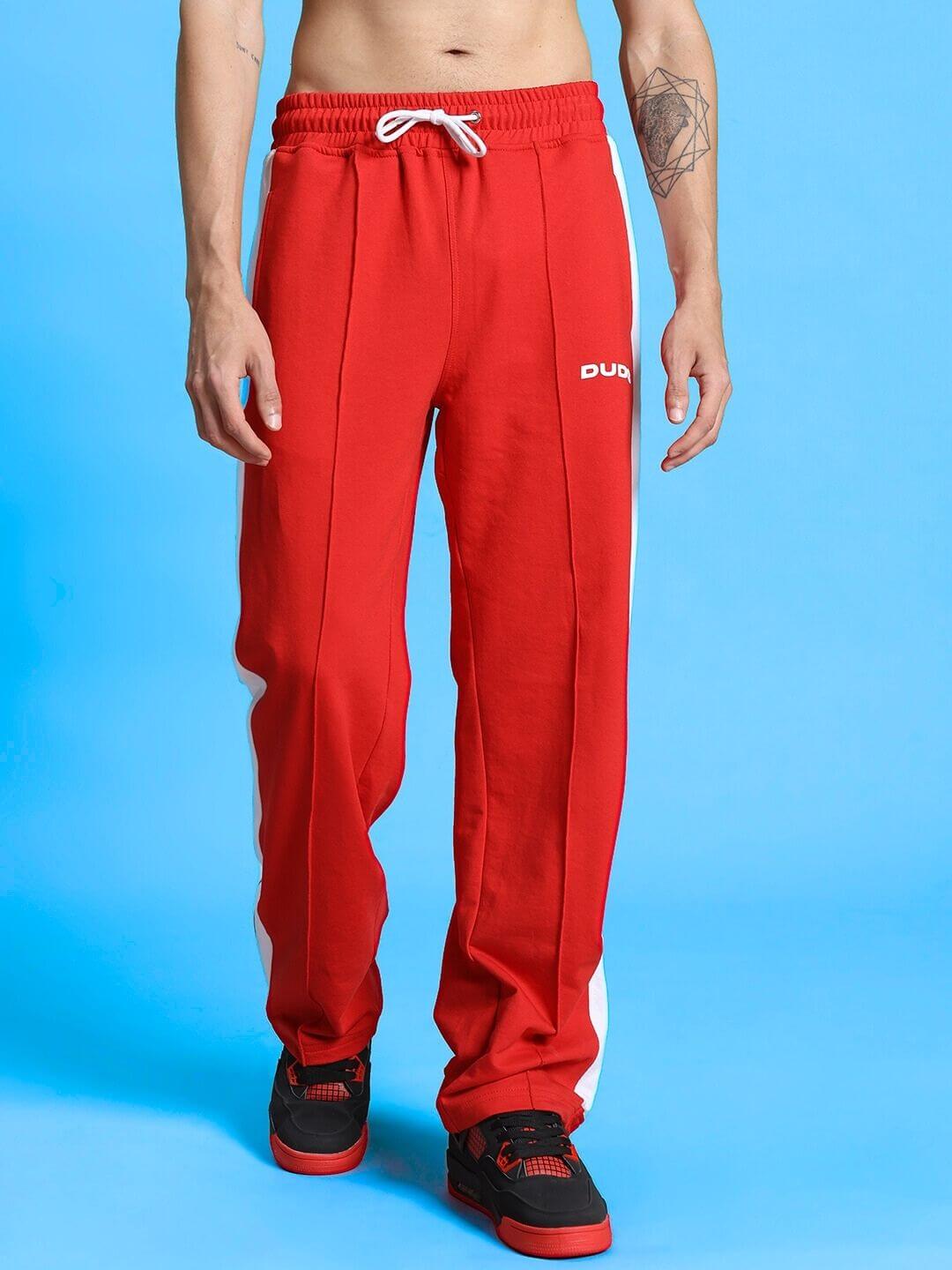Red and white Wonder Slit Zipper Joggers by DUDS, featuring a drawstring waist.