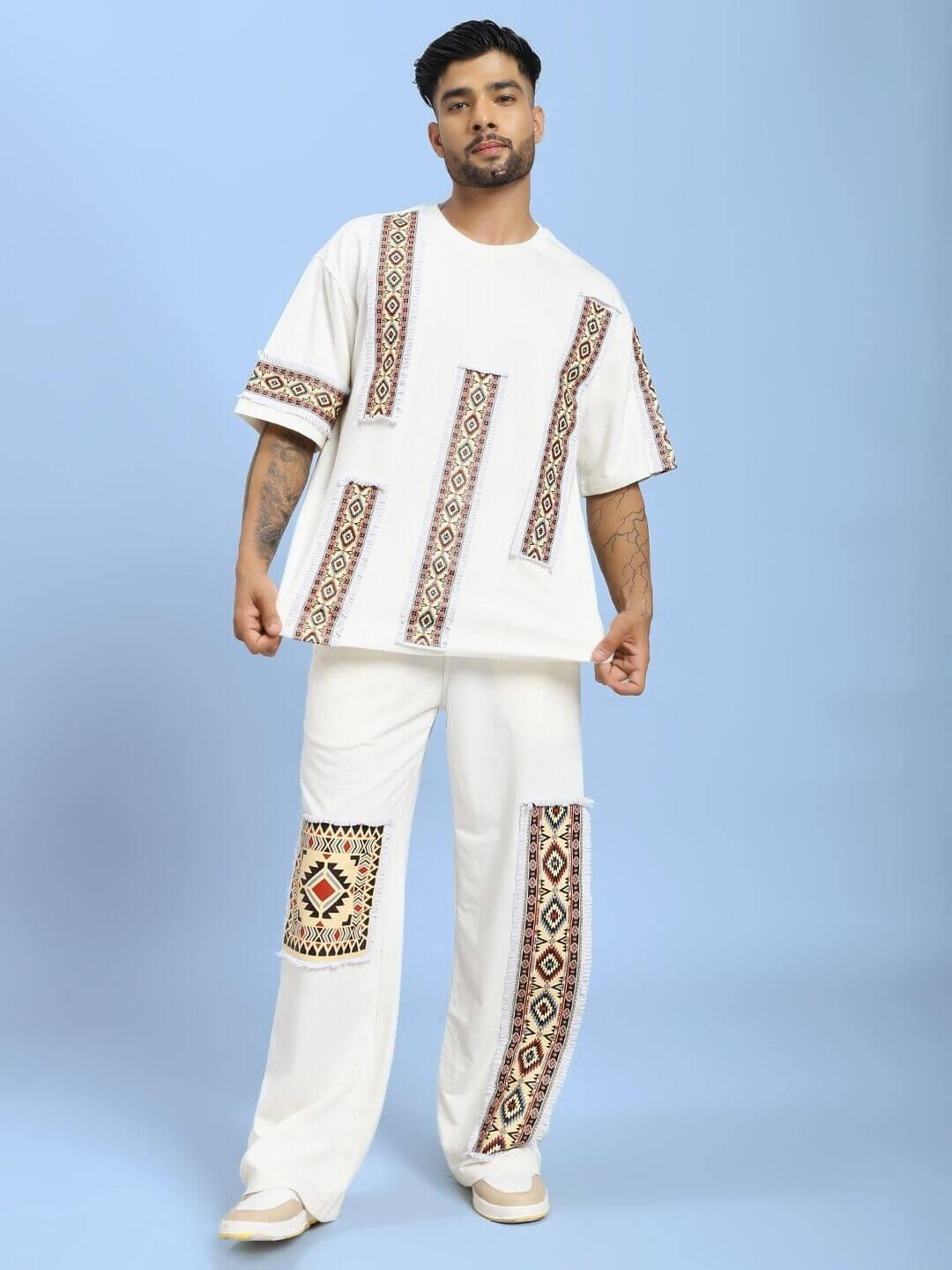 Model wearing YARA GEOMETRIC PRINT CO-ORD SET OFF-WHITE with geometric patterns, showcasing stylish two-piece casual loungewear.