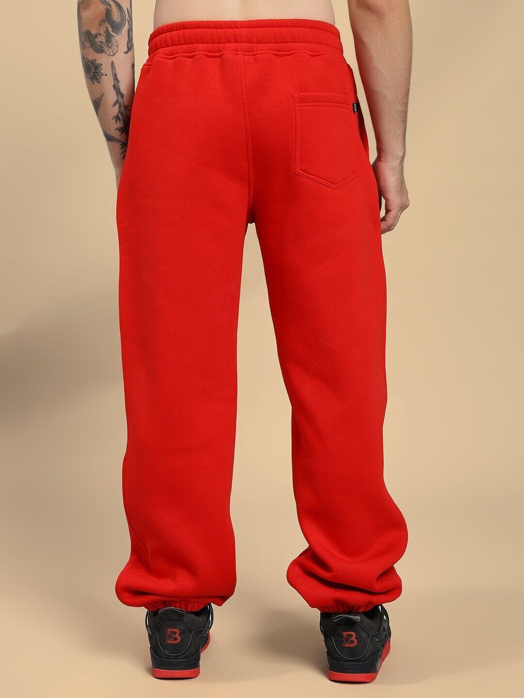 Back view of ZENO RELAXED FIT FLEECE JOGGER RED showcasing relaxed fit and ankle taper.