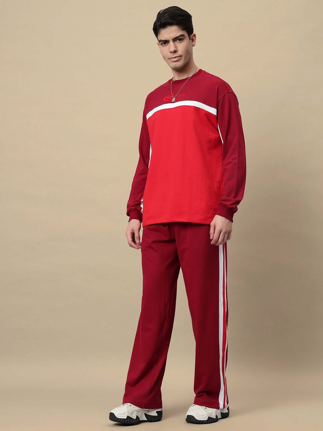 Model wearing ZEST OVERSIZED CO-ORD SET MAROON, featuring oversized maroon sweatshirt and joggers in bold streetwear style.