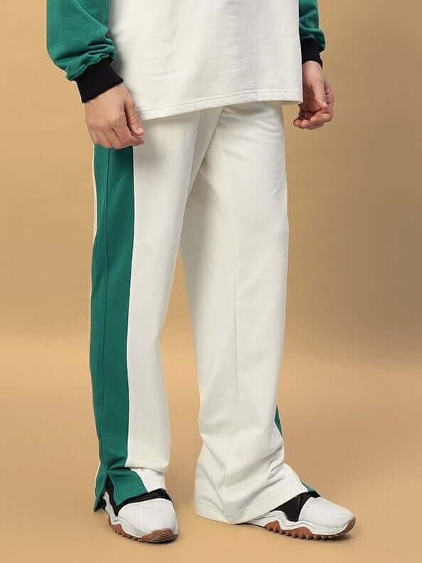 ZINGY JOGGER in off-white and teal, displayed front view, tailored by DUDS, showcasing comfortable fit and custom sizing option available.