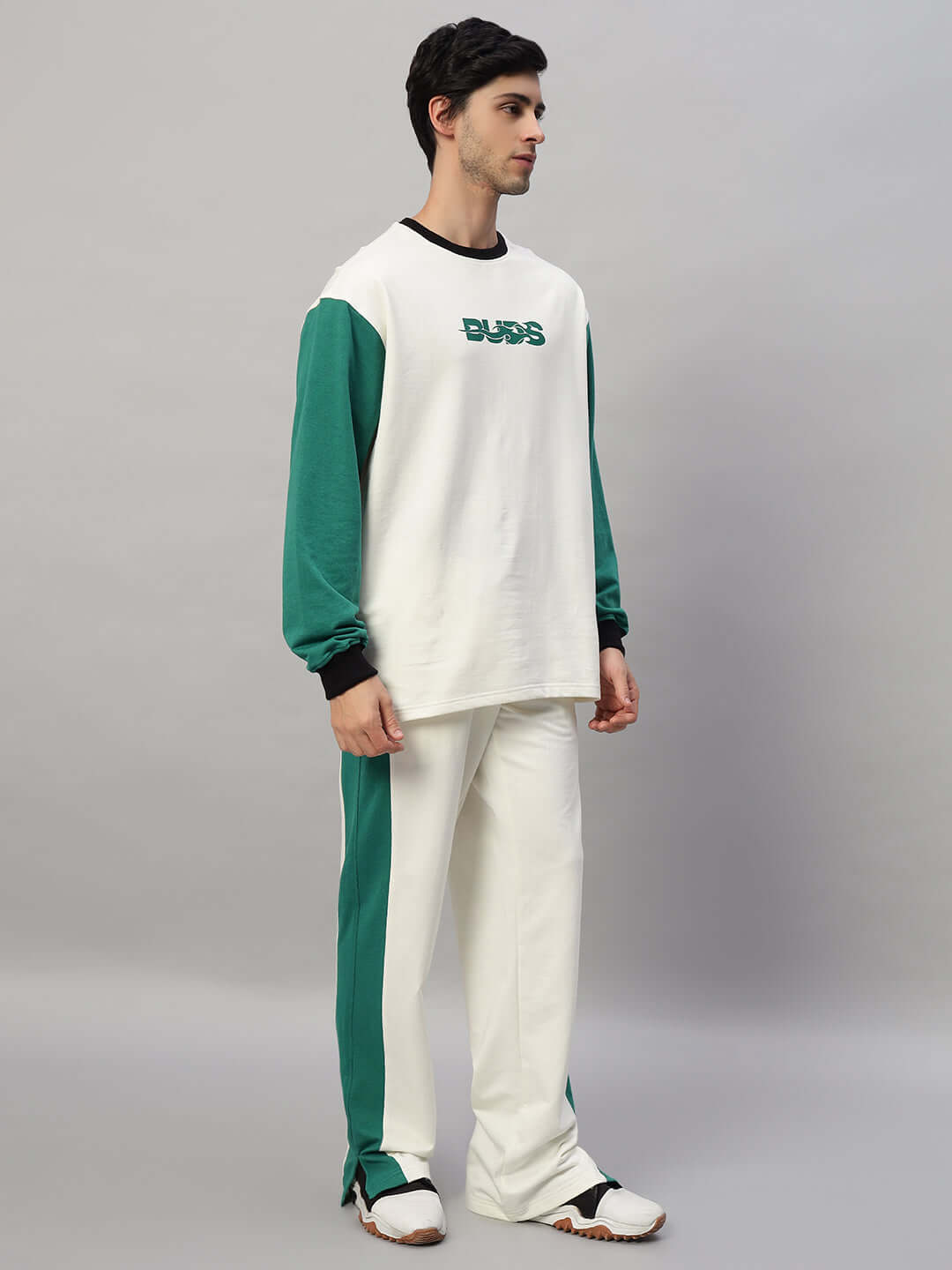 ZINGY OVERSIZED CO-ORD SET OFF WHITE TEAL with relaxed fit joggers and contrast panel top for a stylish unisex look.