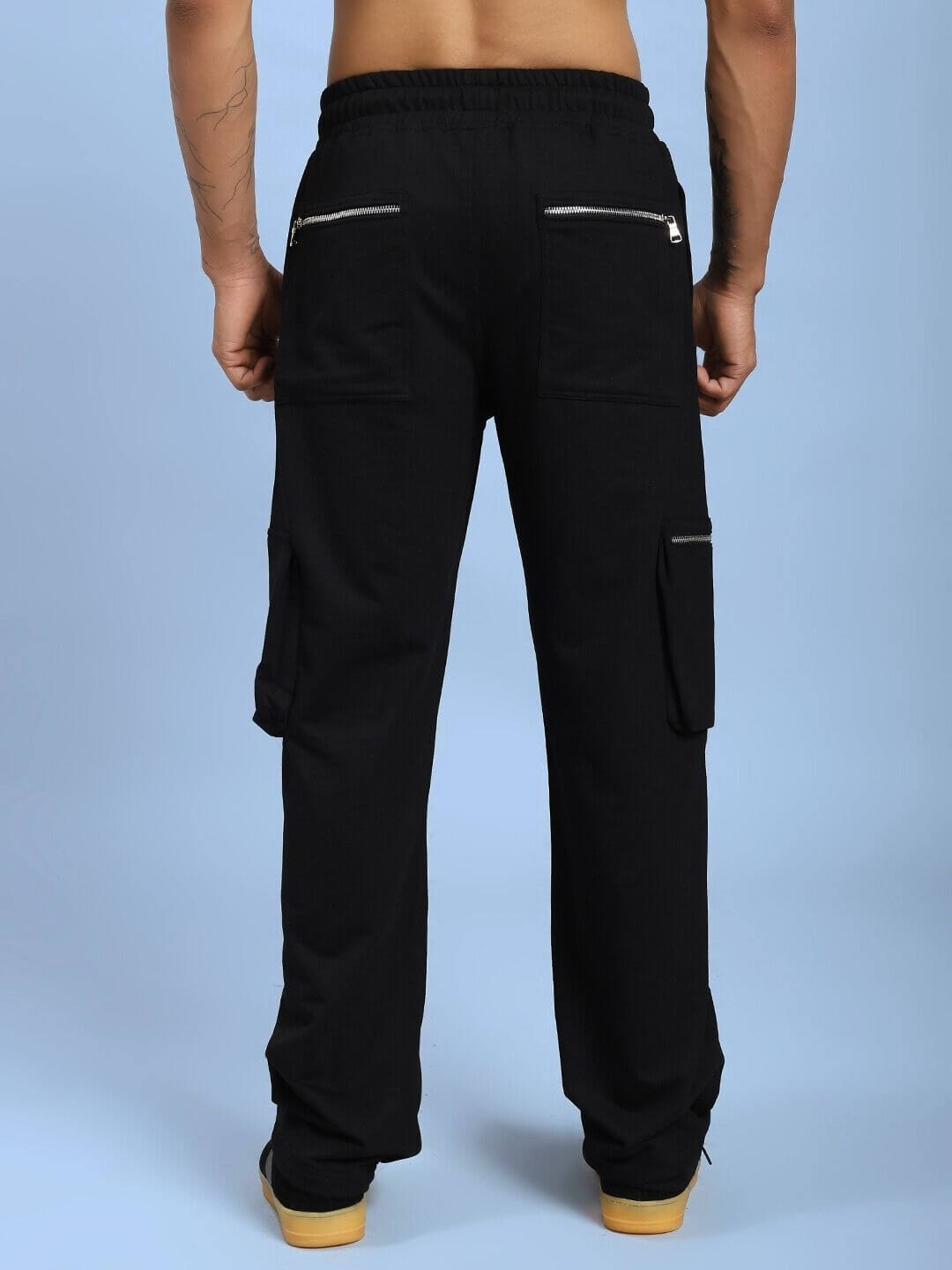 Back view of the ZIP TECH PREMIUM CARGO IN BLACK showcasing multiple pockets and sleek design, ideal for utility and style.