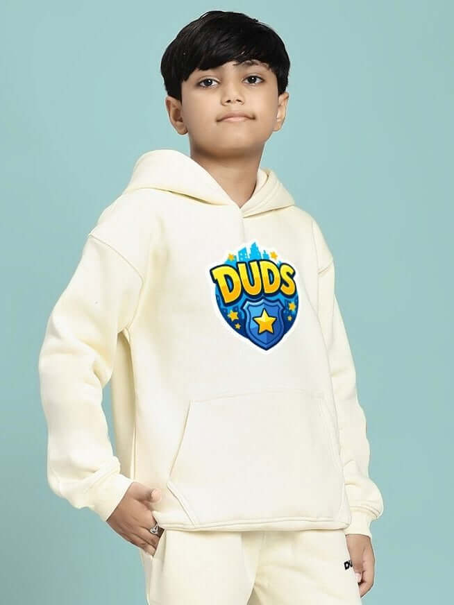 Child wearing ZOOTOPIA WORLD FLEECE HOODIE FOR BOYS AND GIRLS OFF WHITE with playful design and cozy fit.