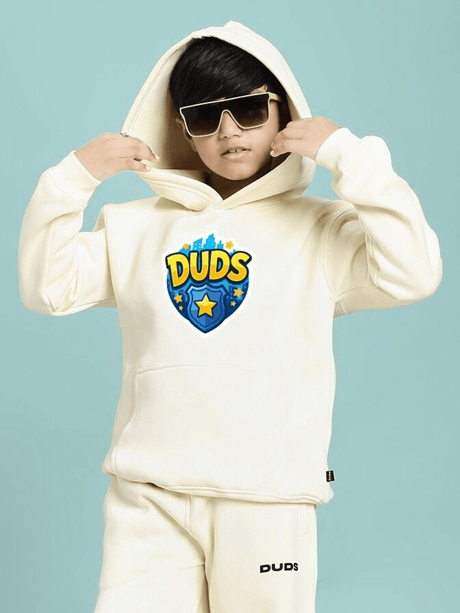 Child wearing ZOOTOPIA WORLD FLEECE HOODIE FOR BOYS AND GIRLS OFF WHITE with playful design, showing cozy style and comfort for kids.