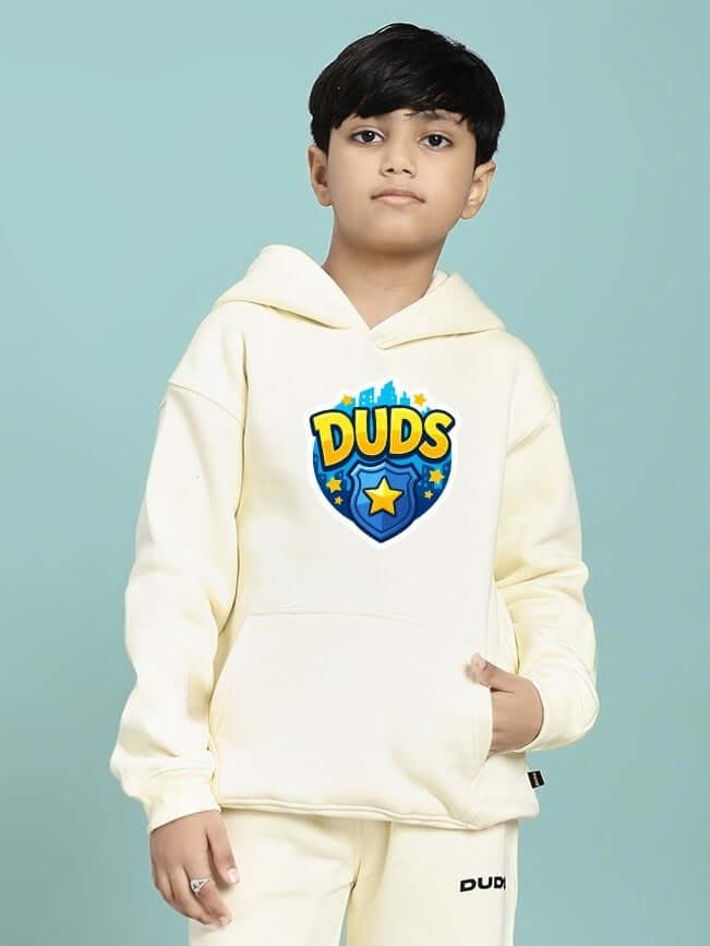 Child wearing ZOOTOPIA WORLD FLEECE HOODIE FOR BOYS AND GIRLS OFF WHITE, featuring playful design and cozy comfort.