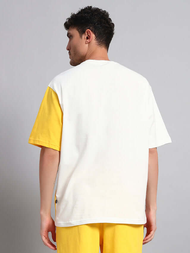 TOM & JERRY off-white yellow oversized t-shirt, perfect for summer with breathable cotton, modeled from the back.