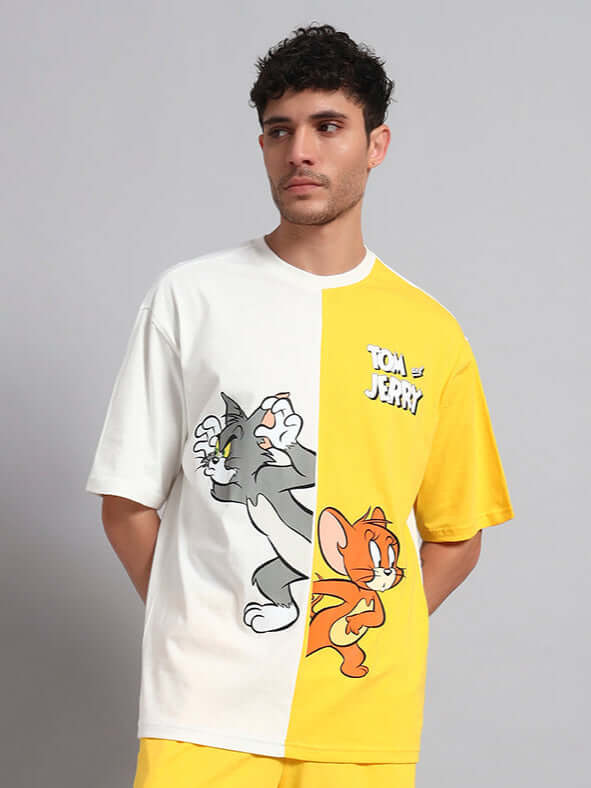 Tom & Jerry oversized t-shirt in off-white and yellow, featuring a breathable cotton design, perfect for a trendy and comfy summer look.