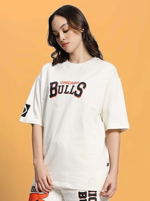 Woman wearing oversized off-white Chicago Bulls t-shirt made of premium cotton fabric.