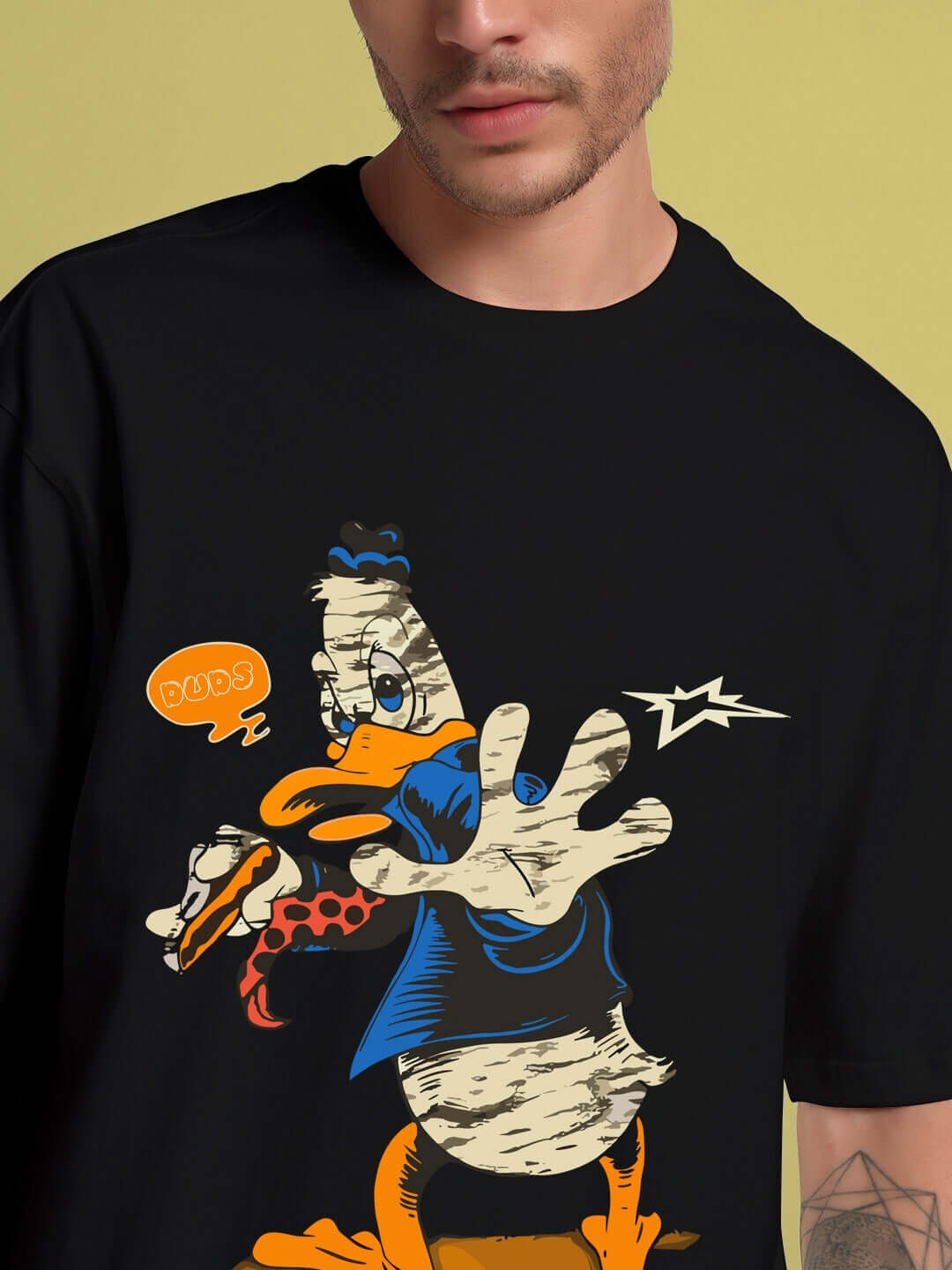 Close-up of Quack Off Co-Ord Set in black, featuring a cartoon character on the T-shirt made of premium cotton French terry lycra.