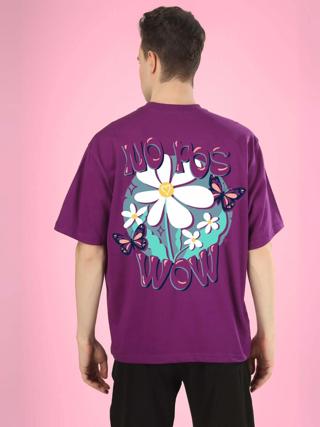 Back view of NO POS WOW oversized purple t-shirt with floral print and butterflies, customizable for custom fit options.