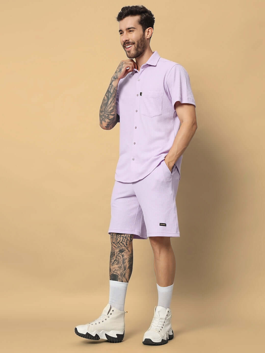 Model wearing MERCY SOLID CO-ORD SET in lilac, made from waffle cotton fabric, showcasing half sleeves and relaxed fit. Ideal for casual outings.