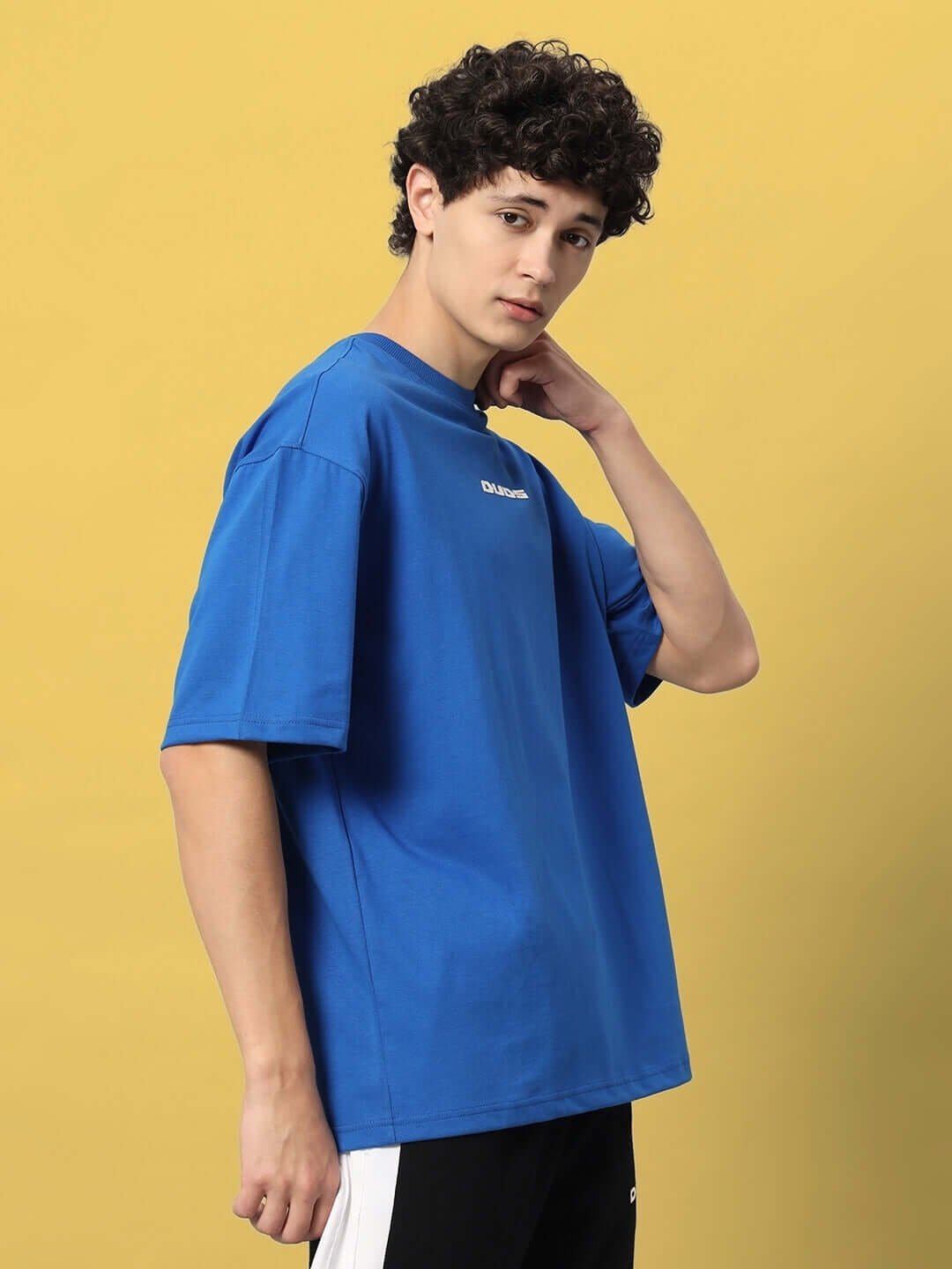 Man wearing Victory Over-Sized T-Shirt Royal Blue