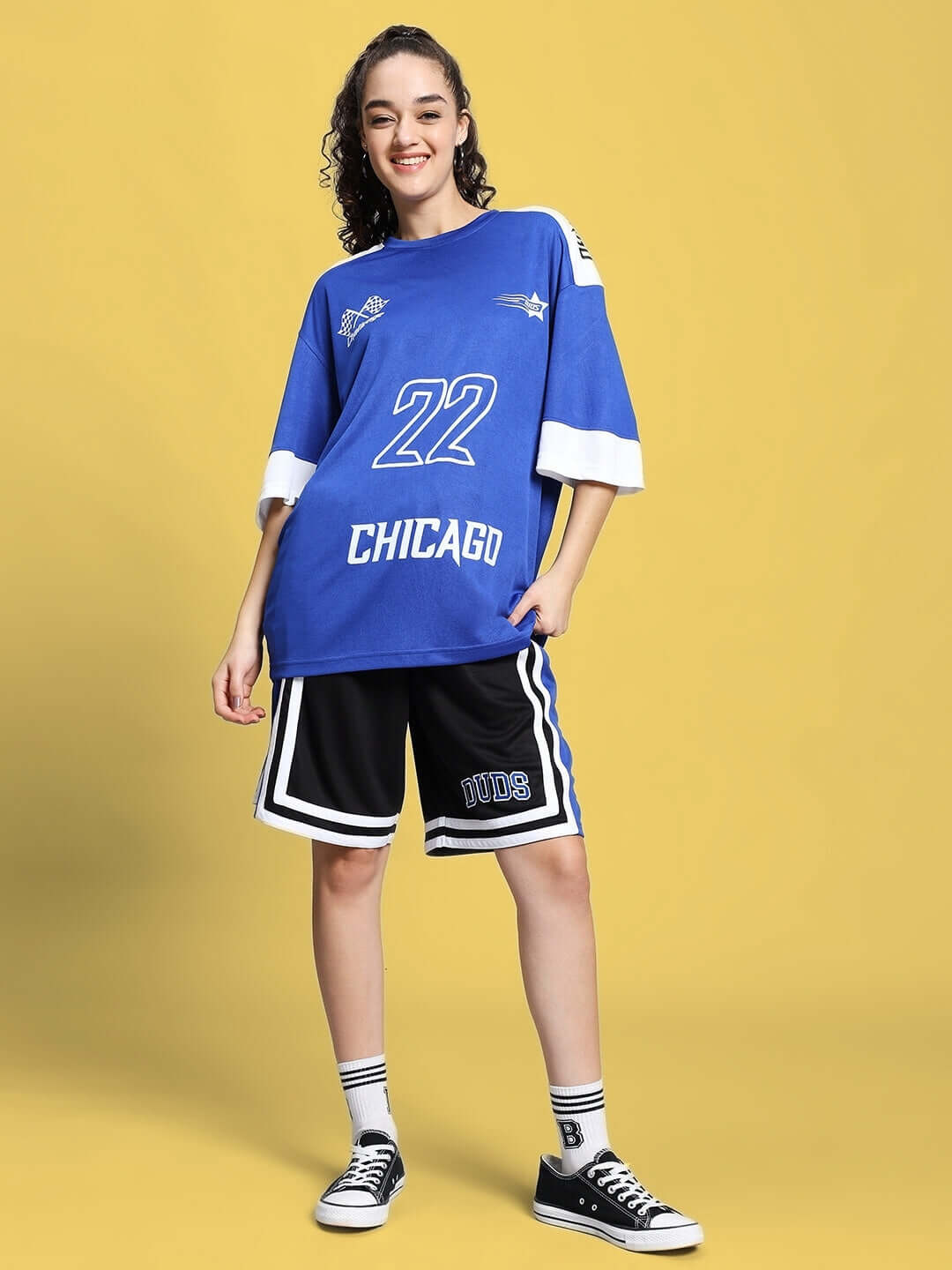 Model wearing Women's Challenge Colorblock Co-ord Set in royal blue with sporty design, featuring shorts and top. Sports style outfit.