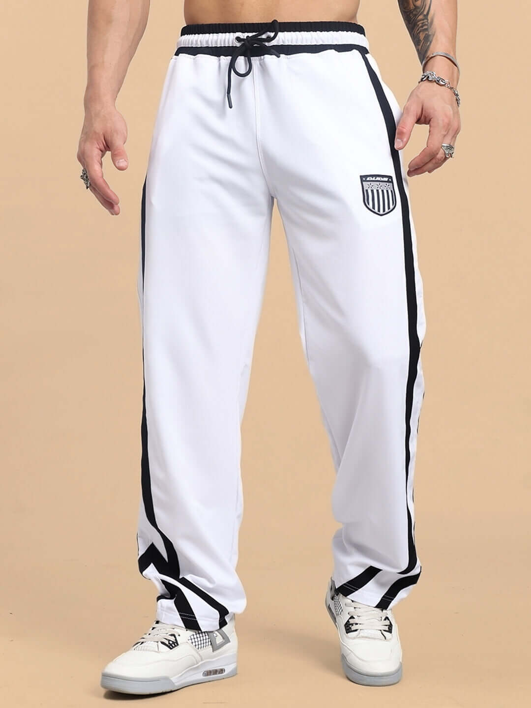 FRIZZLE Relaxed Fit Jogger in white with black stripes, featuring a customizable fit by DUDS, tailor-made for comfort and style.