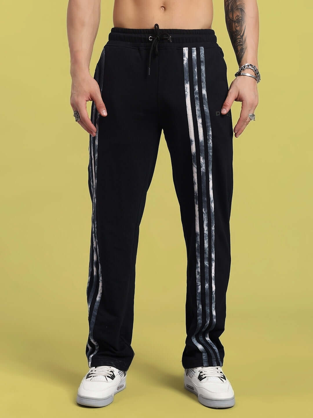 Stylish FLICKER JOGGER in black, featuring unique side stripes, made by DUDS experienced tailors, available for custom fit orders.