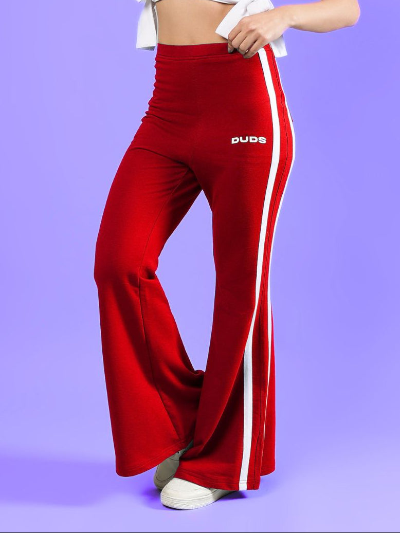 WOMENS FITTONIA COOL WIDE FLARE JOGGERS RED showcasing a stylish wide-flare silhouette in vibrant red.
