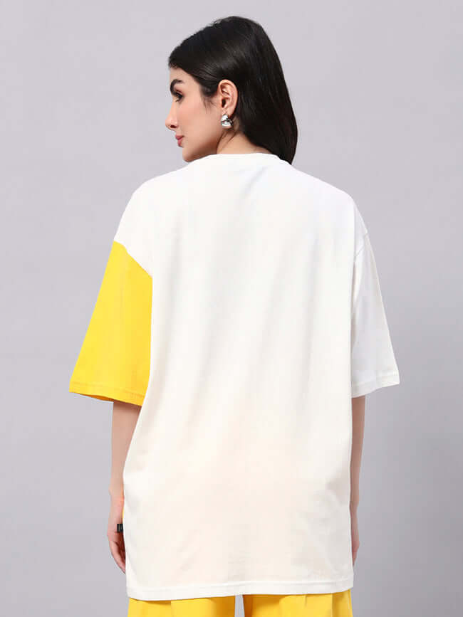 Back view of women's off-white yellow Tom & Jerry oversized t-shirt, ideal for a trendy summer look with breathable cotton fabric.