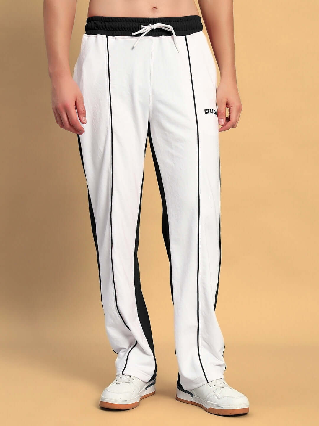 LAGOON Relaxed Fit Joggers in white and black, showcasing stylish contrast panels and comfortable fit ideal for casual wear or sports.