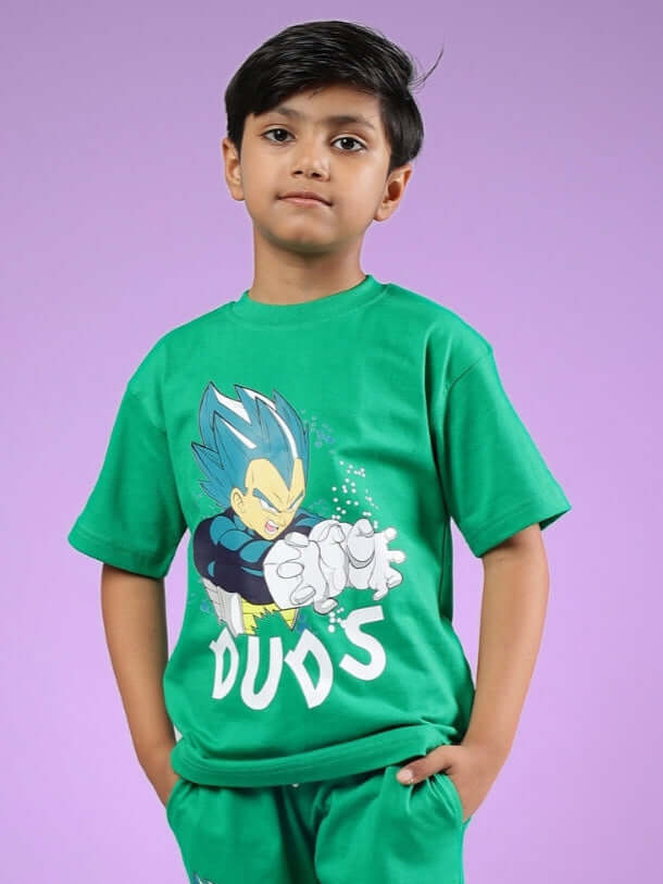 Child wearing green Satoru t-shirt featuring vibrant anime design by DUDS, showcasing a colorful character against a purple background.