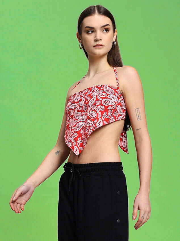 Model wearing Women's Ziva Crop-Top in red with paisley design, made from 100% cotton premium heavy gauge fabric.