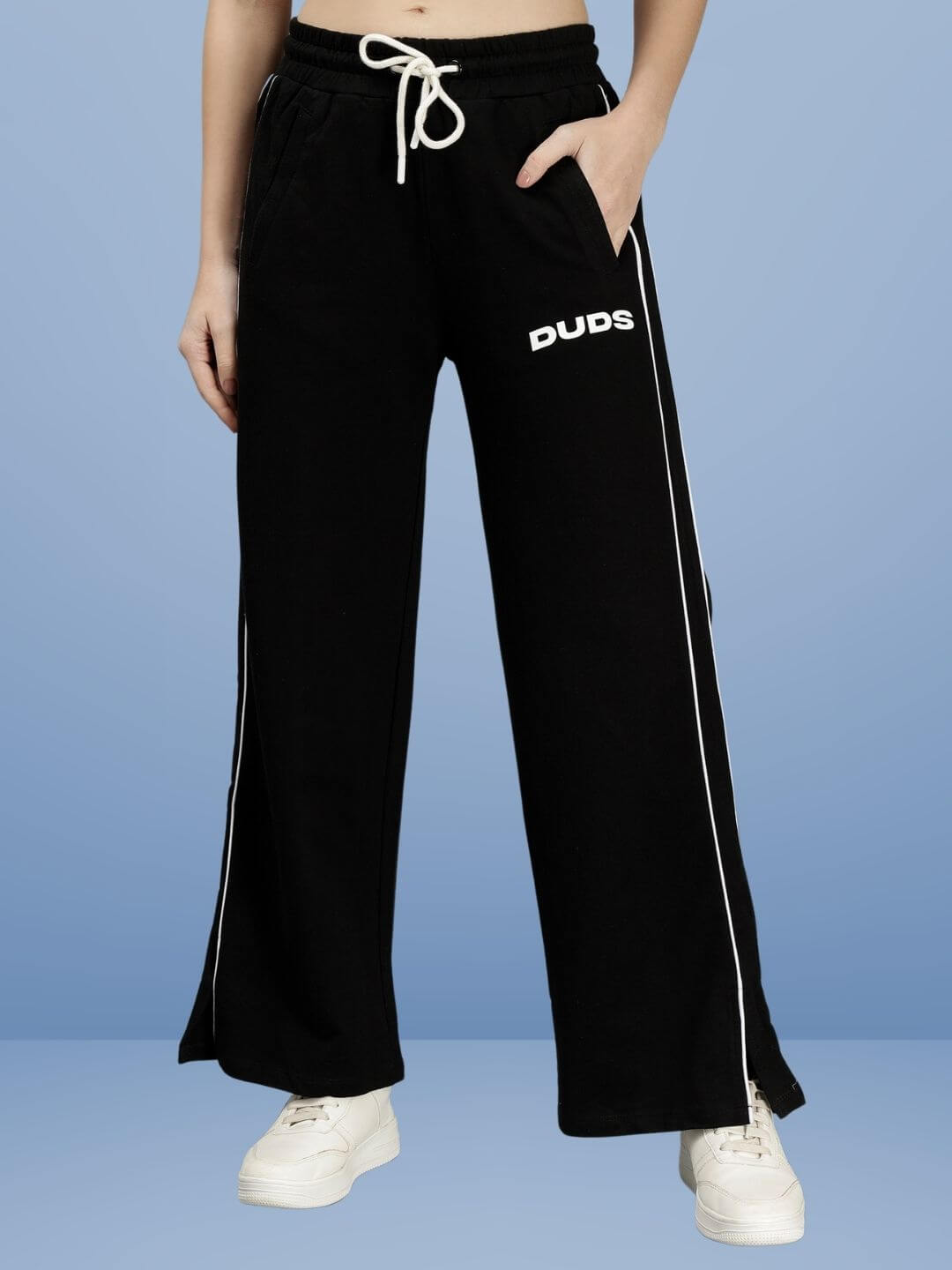 WOMEN RIO RELAXED FIT JOGGERS BLACK featuring a stylish casual design with a drawstring waist and side stripes.