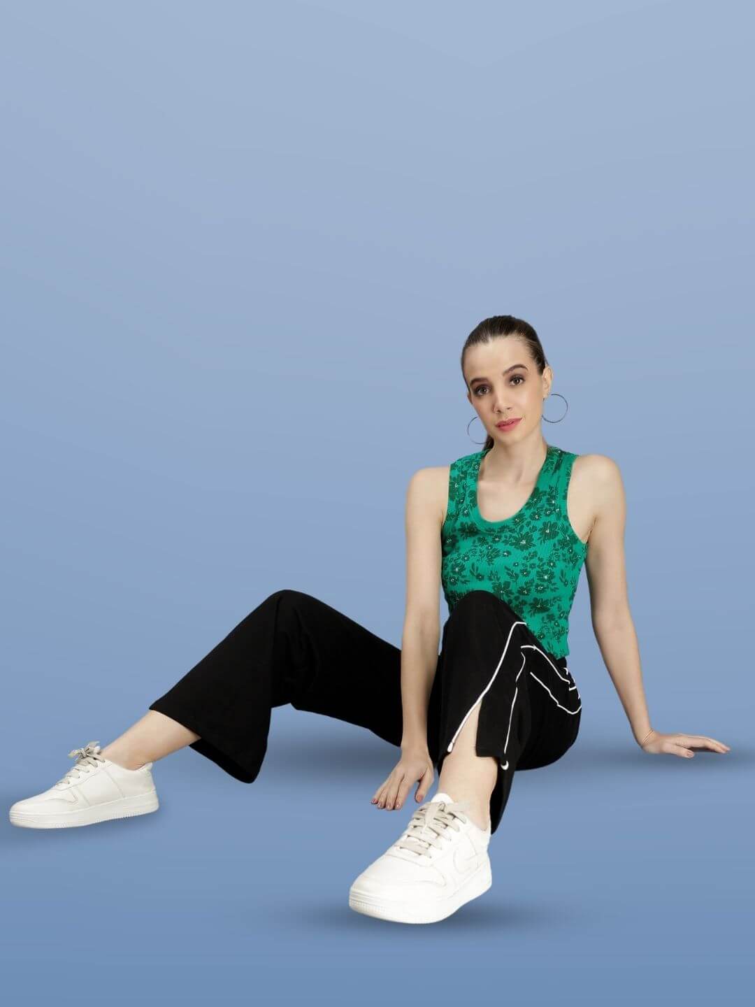 Model wearing WOMEN RIO RELAXED FIT JOGGERS BLACK, showcasing casual style and comfort.