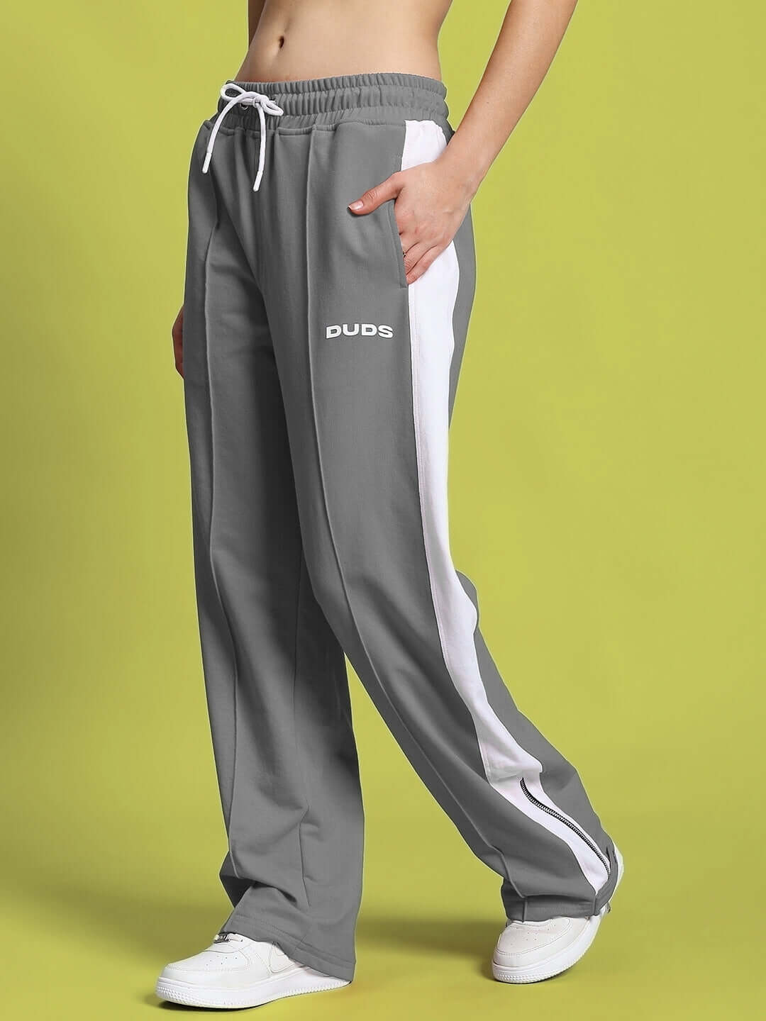 Women's grey and white Wonder Slit Zipper Joggers by DUDS, shown with custom fit option, experienced tailor-made quality.