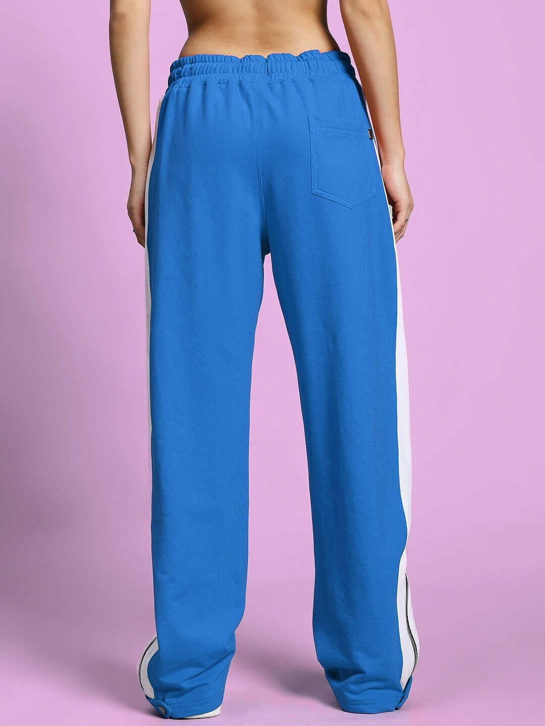 Back view of Women's Wonder Slit Zipper Joggers in blue-white with elastic waistband and stylish design.