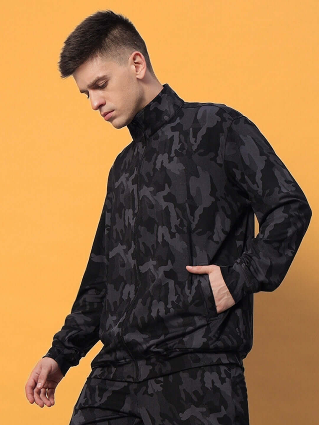 Model wearing DEFENCE CAMOUFLAGE JACKET in Camo Navy, tailored by DUDS. Custom fit available for prepaid orders.