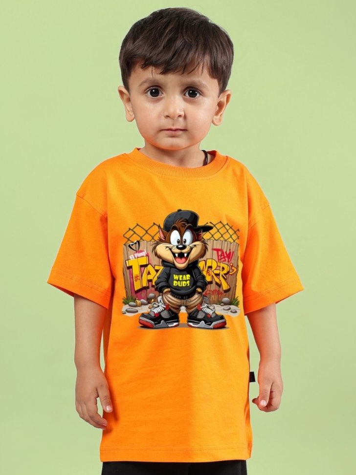 Boy wearing an orange Crazy Rapper t-shirt featuring hip-hop themed character design, perfect for street fashion and hip-hop culture lovers.