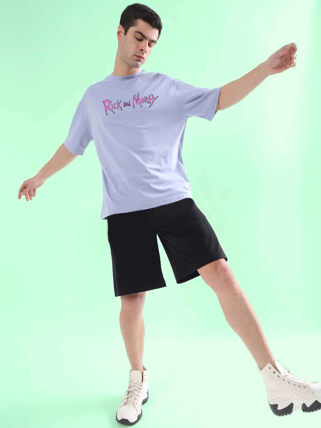 Model wearing BACK IN TIME OVER-SIZED T-SHIRT LILAC, 100% cotton, bio-washed. Casual style with premium heavy gauge fabric.